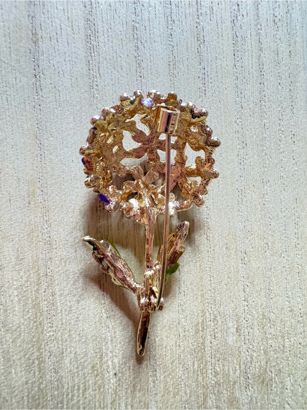 Purple Floral Cluster Brooch with Gold Stem and Green Leaves